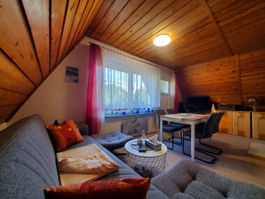 Wohnzimmer in der Ferienwohnung am Mühlenhög in Finsterbergen
